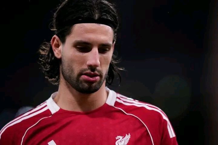 a man with long hair and a beard